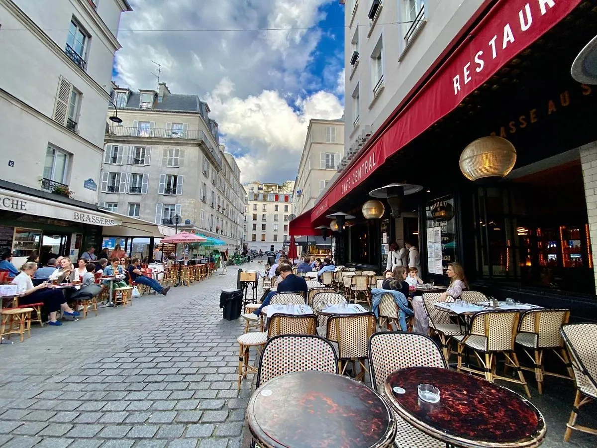 Апартаменты Tour Eiffel Studio Lumineux Avec Terrasse. Париж